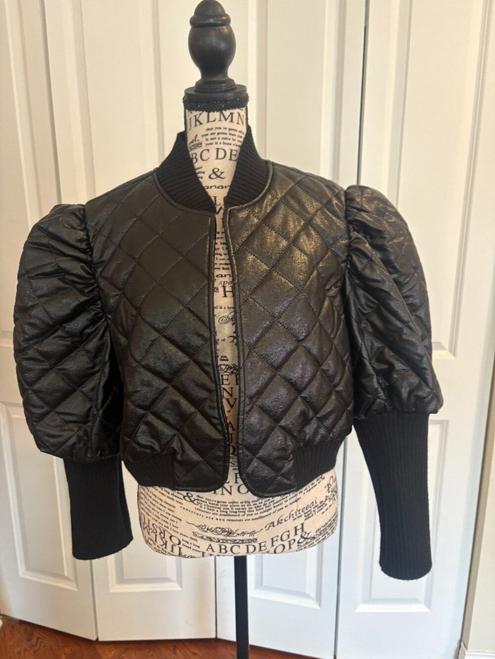 Very cool faux leather/knit balloon sleeve bomber from local designer size L